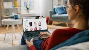 Young Woman at Home Using Laptop